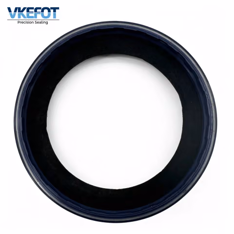 VKEFOT 101x125/130x13.5/21.5 mm wheel hub oil seal in blue NBR, angled view showing the bore and the case step